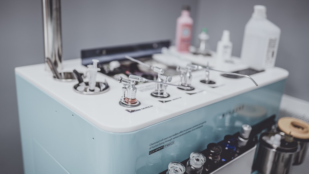 a-close-up-of-a-machine-with-a-lot-of-bottles-on-it-sgjqibjgrvo